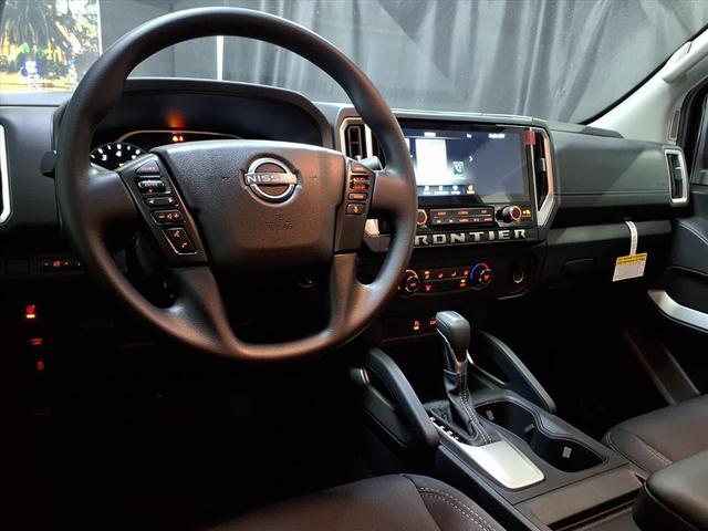Photo of 2026 Bluestone Pearl Nissan Frontier