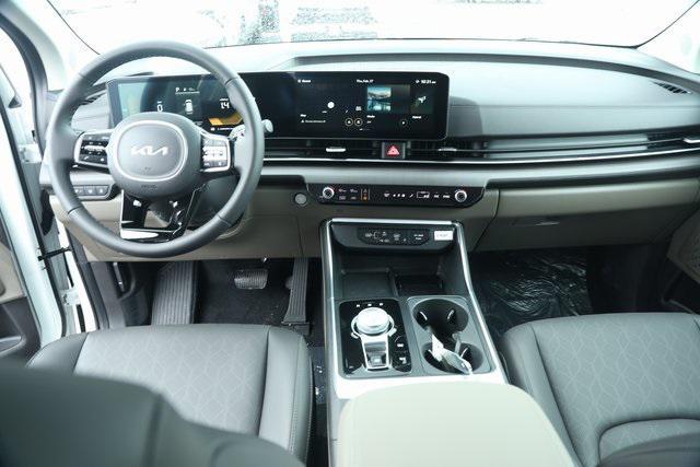 Photo of 2025 Snow White Pearl Kia Carnival Hybrid