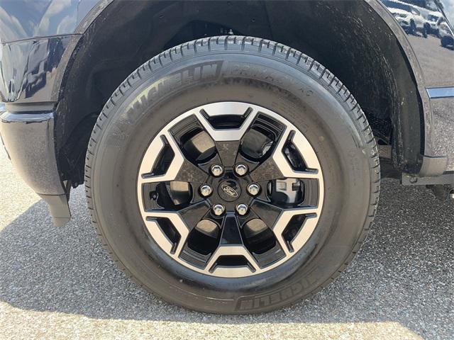 Photo of 2023 Blue Metallic Ford F-150 Lightning