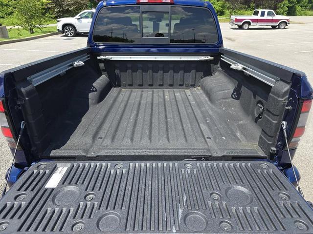 Photo of 2022 Deep Blue Pearl Nissan Frontier