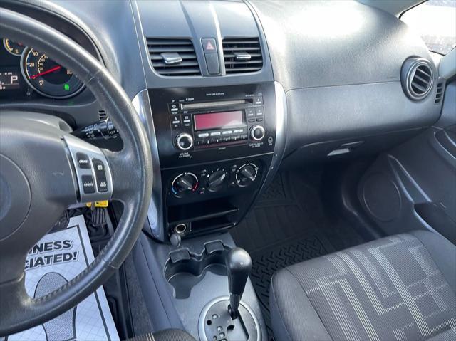 Photo of 2012 White Water Pearl Suzuki SX4