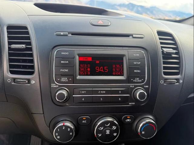 Photo of 2014 Bright Silver Kia Forte