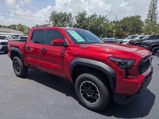 Photo of 2025 Red Toyota Tacoma Hybrid