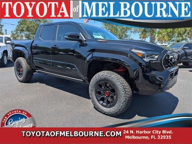 Photo of 2025 Black Toyota Tacoma Hybrid
