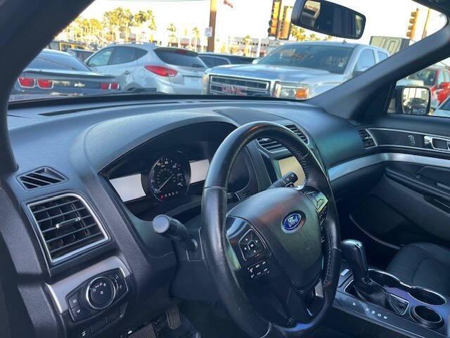 Photo of 2016 Ruby Red Metallic Tinted Clearcoat Ford Explorer