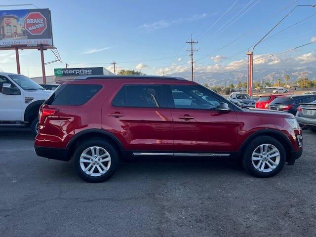 Photo of 2016 Ruby Red Metallic Tinted Clearcoat Ford Explorer