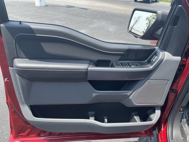 Photo of 2025 Rapid Red Metallic Tinted Clearcoat Ford F-150 Lightning