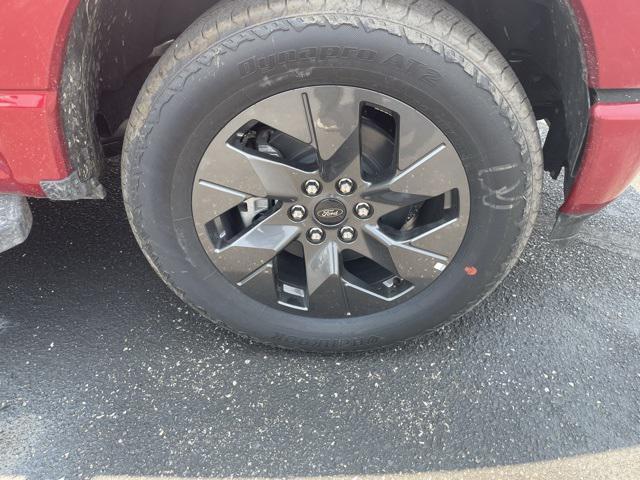 Photo of 2025 Rapid Red Metallic Tinted Clearcoat Ford F-150 Lightning