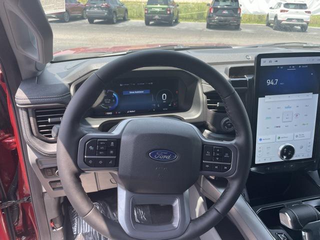 Photo of 2025 Rapid Red Metallic Tinted Clearcoat Ford F-150 Lightning