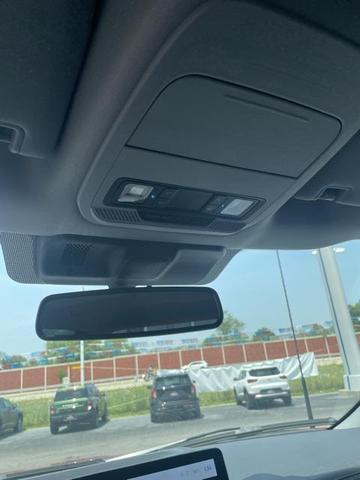Photo of 2025 Rapid Red Metallic Tinted Clearcoat Ford F-150 Lightning