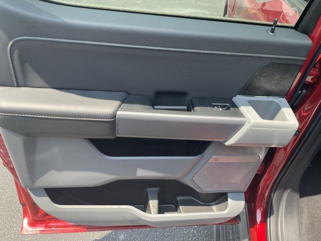 Photo of 2025 Rapid Red Metallic Tinted Clearcoat Ford F-150 Lightning