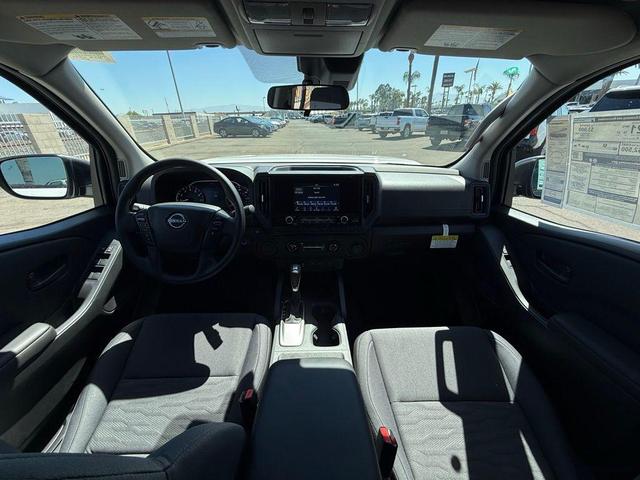 Photo of 2025 Glacier White Nissan Frontier