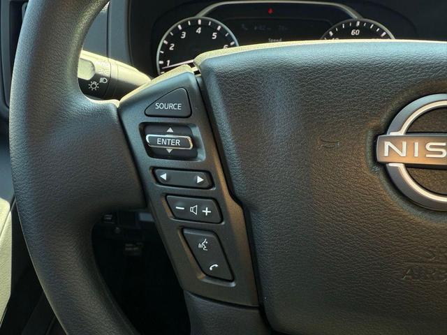 Photo of 2025 Glacier White Nissan Frontier