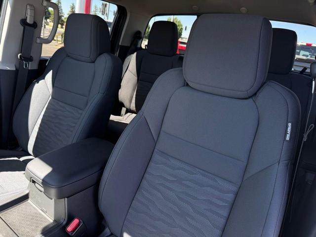 Photo of 2025 Glacier White Nissan Frontier