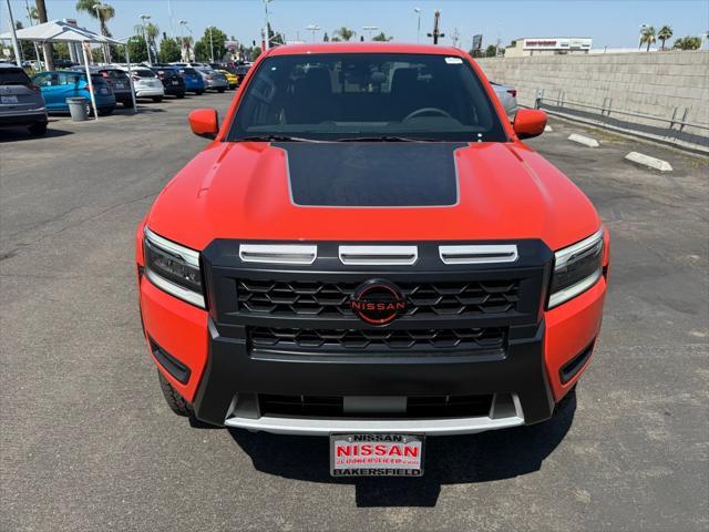 Photo of 2025 Afterburn Orange Nissan Frontier