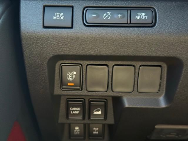 Photo of 2025 Afterburn Orange Nissan Frontier
