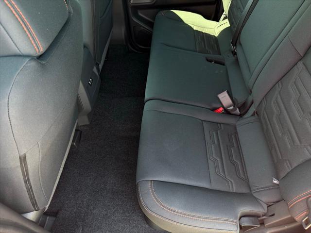 Photo of 2025 Afterburn Orange Nissan Frontier