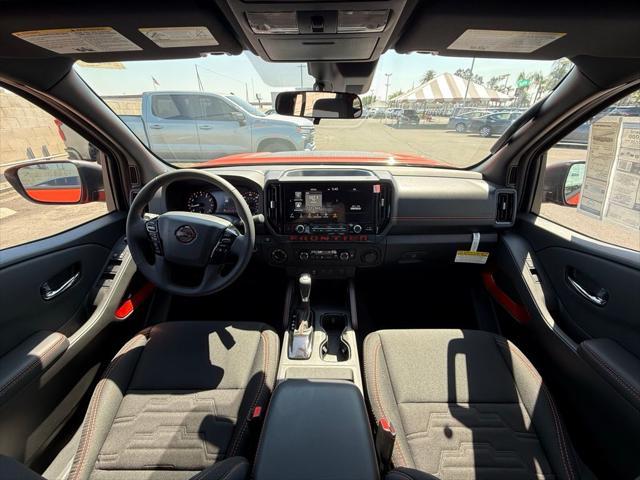 Photo of 2025 Afterburn Orange Nissan Frontier