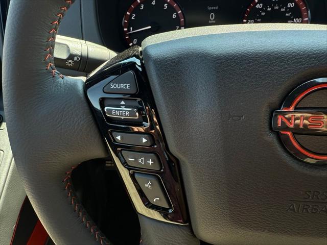 Photo of 2025 Afterburn Orange Nissan Frontier
