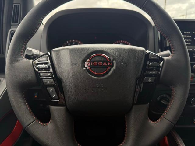 Photo of 2025 Tactical Green Metallic Nissan Frontier