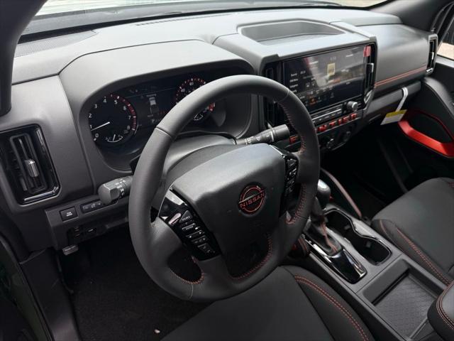 Photo of 2025 Tactical Green Metallic Nissan Frontier