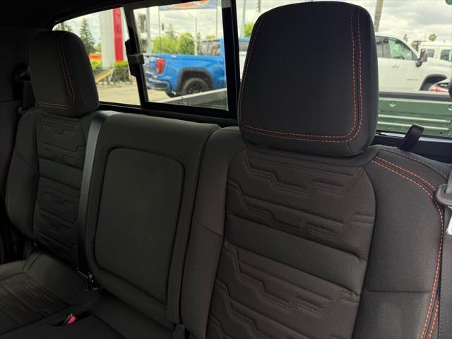 Photo of 2025 Tactical Green Metallic Nissan Frontier