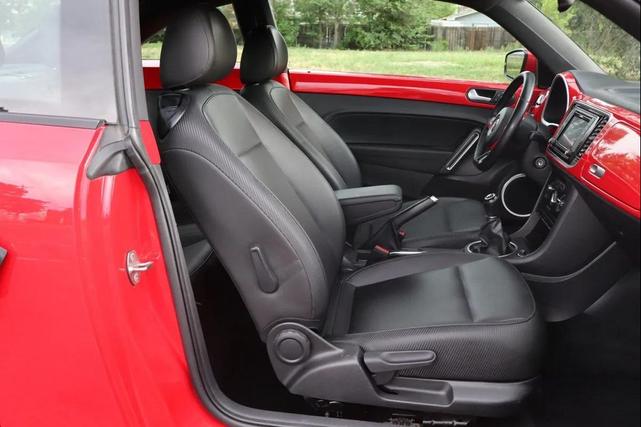 Photo of 2016 Tornado Red Volkswagen Beetle