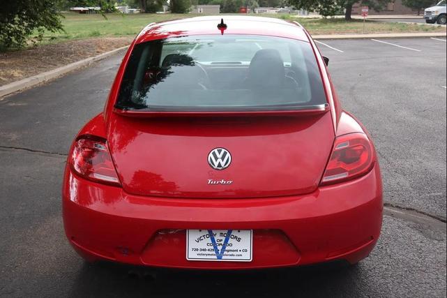 Photo of 2016 Tornado Red Volkswagen Beetle