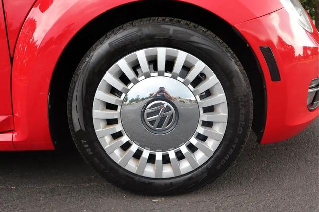Photo of 2016 Tornado Red Volkswagen Beetle