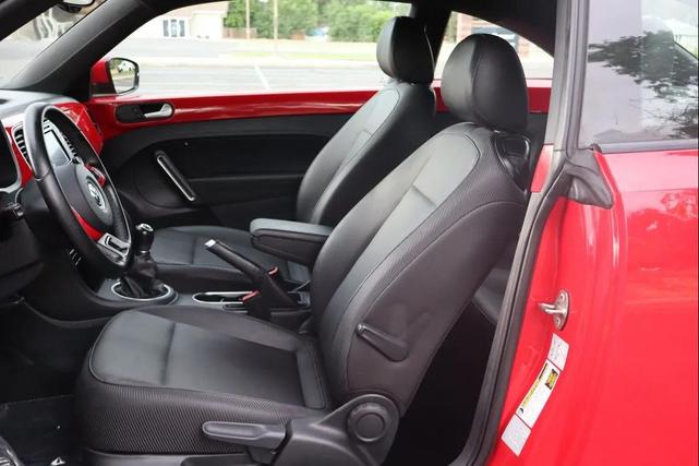 Photo of 2016 Tornado Red Volkswagen Beetle
