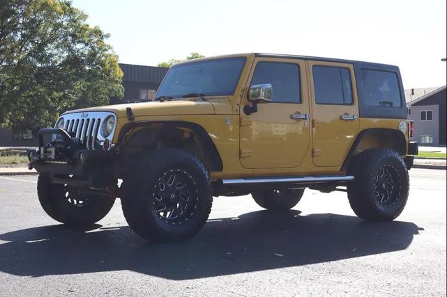 Photo of 2011 Yellow Jeep Wrangler Unlimited