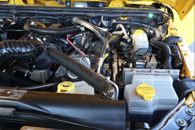 Photo of 2011 Yellow Jeep Wrangler Unlimited