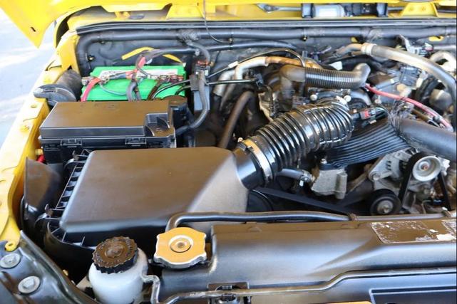 Photo of 2011 Yellow Jeep Wrangler Unlimited