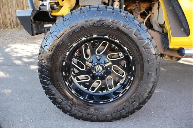 Photo of 2011 Yellow Jeep Wrangler Unlimited