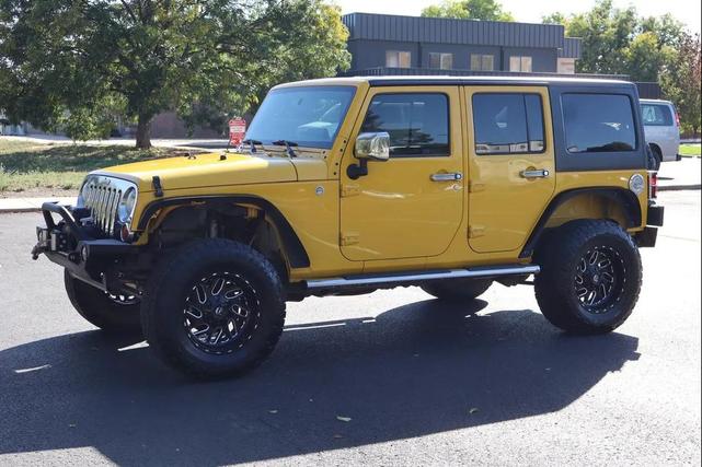 Photo of 2011 Yellow Jeep Wrangler Unlimited