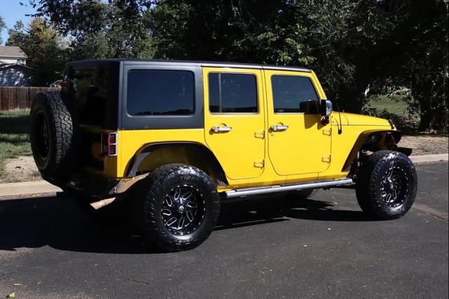 Photo of 2011 Yellow Jeep Wrangler Unlimited