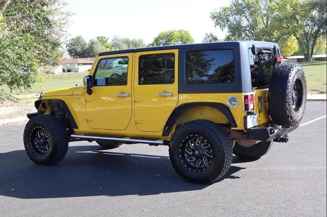 Photo of 2011 Yellow Jeep Wrangler Unlimited