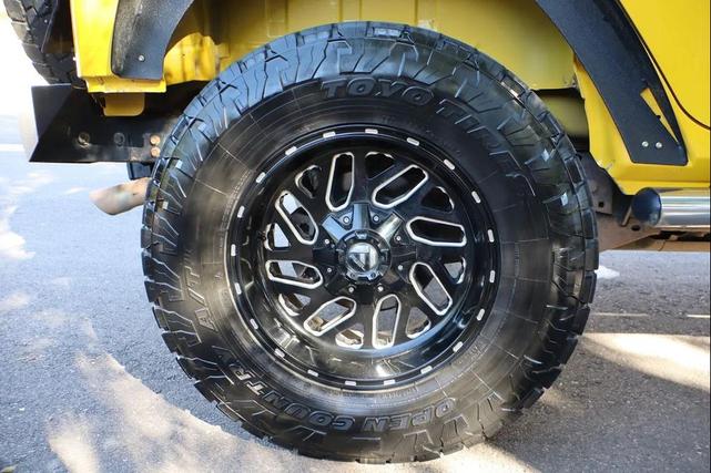 Photo of 2011 Yellow Jeep Wrangler Unlimited