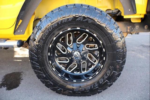 Photo of 2011 Yellow Jeep Wrangler Unlimited