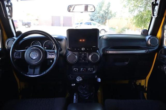 Photo of 2011 Yellow Jeep Wrangler Unlimited