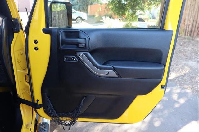 Photo of 2011 Yellow Jeep Wrangler Unlimited