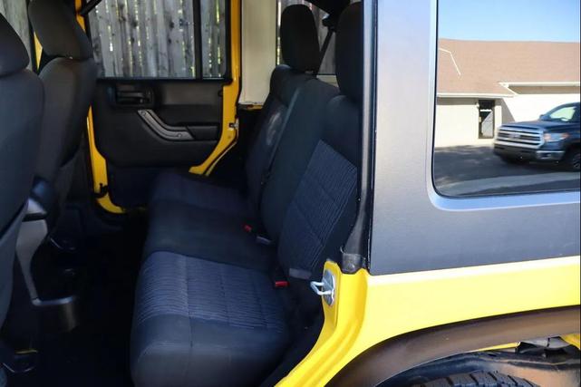 Photo of 2011 Yellow Jeep Wrangler Unlimited