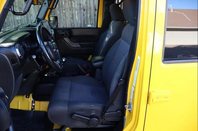 Photo of 2011 Yellow Jeep Wrangler Unlimited