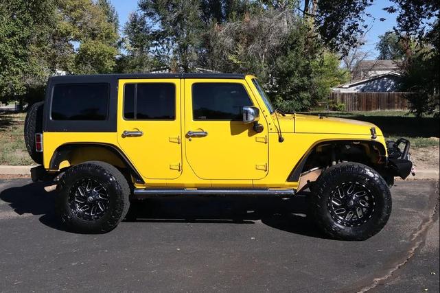 Photo of 2011 Yellow Jeep Wrangler Unlimited