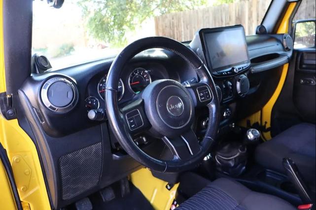 Photo of 2011 Yellow Jeep Wrangler Unlimited