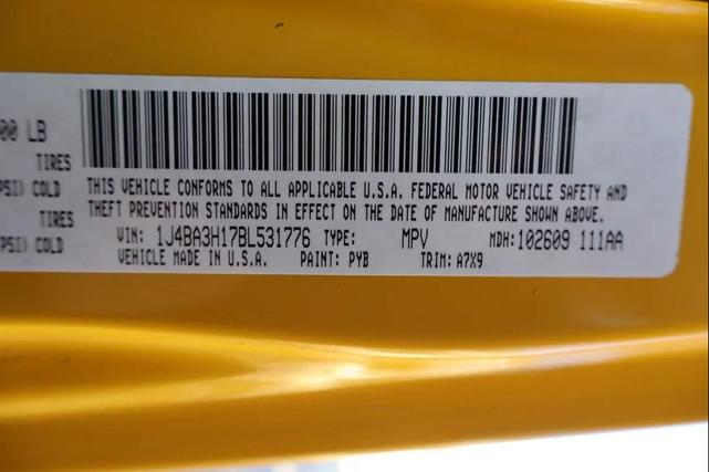 Photo of 2011 Yellow Jeep Wrangler Unlimited