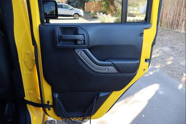 Photo of 2011 Yellow Jeep Wrangler Unlimited