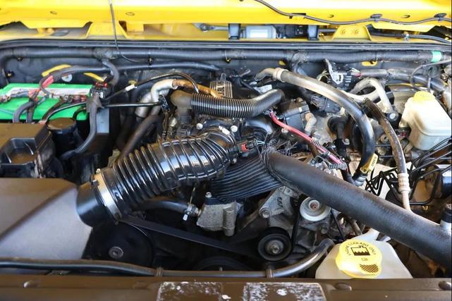 Photo of 2011 Yellow Jeep Wrangler Unlimited