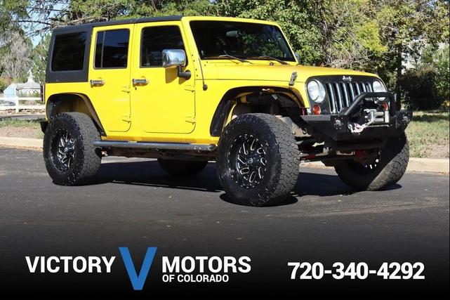 Photo of 2011 Yellow Jeep Wrangler Unlimited
