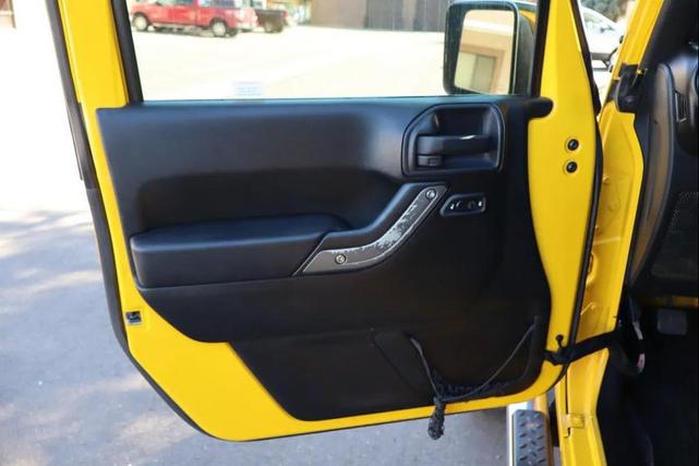 Photo of 2011 Yellow Jeep Wrangler Unlimited